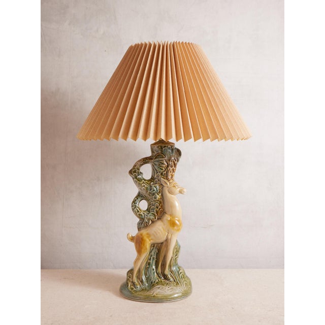 Gorgeous pair of coordinating deer lamps with the most incredible majolica style glaze. These have been cleaned and...