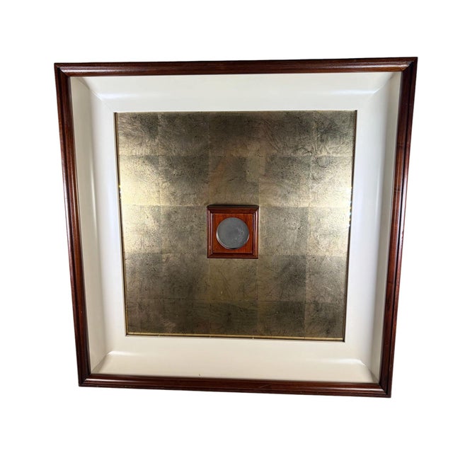 A striking large scale mirror featuring a beautifully aged gold leaf surface set within a richly toned mahogany frame. The...