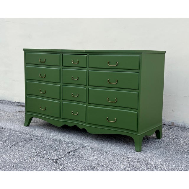 Mid-Century Modern Mahogany Dresser of Twelve Drawers This dresser is nicely refinished in green with satin topcoat This...