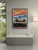 The Piece This original 1972 Porsche poster celebrates the brand's participation in the Silverstone Interserie. Designed...