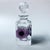 A signed Daum France crystal perfume bottle from the Coppelia series, featuring a deeply carved floral motif in rich...