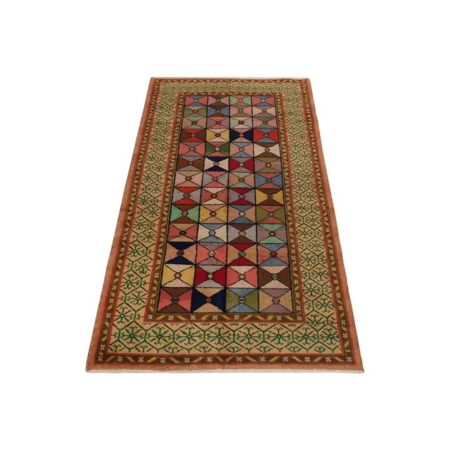Hand-knotted in wool, a 4x7 vintage rug from a venerated multidisciplinary Turkish designer entering Rug & Kilim’s...