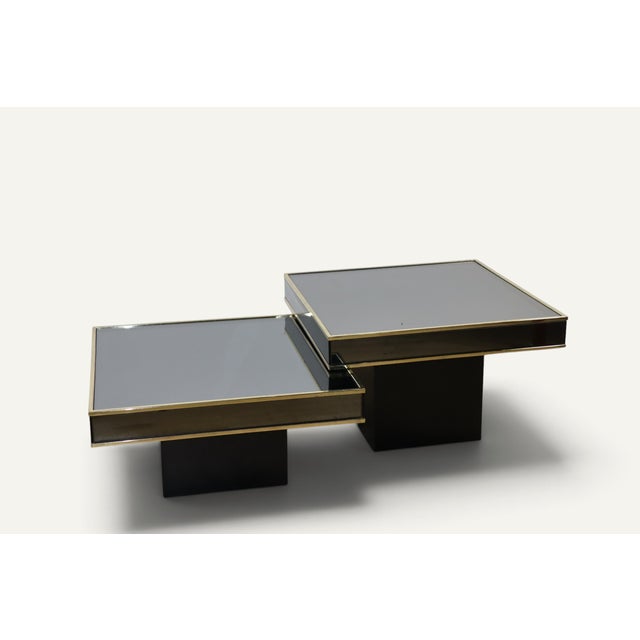 This elegant pair of modular Italian coffee tables from the 1970s was produced by Cidue, as evidenced by the original...