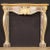Italian fireplace from the second half of the 20th century. Front fireplace decoration in carved, lacquered and gilded...