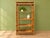 Beautiful tortoise shell burned bamboo vintage etagere with five removable shelves. A classic for the ages featuring...