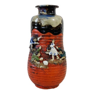 Chinoiserie Decorative Ceramic Vase W/High Relief Boys Figures 9.25"h For Sale