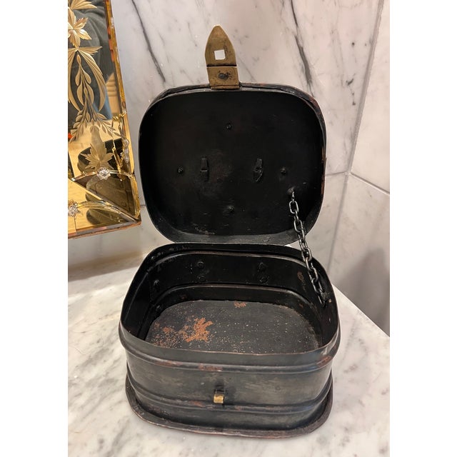 Iron box with brass accents - unsure of exact origin but is estimated to be from the early 1900s. Strikingly rustic, this...