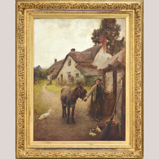 This finely executed rural scene depicts a young boy leading a donkey through a tranquil Devon village of thatched...