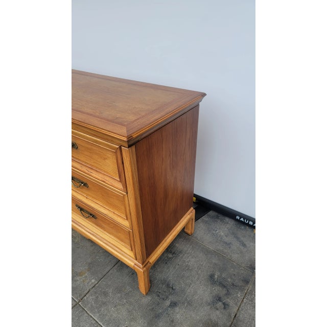 Shalimar By Thomasville made in the 1960s of pecan wood. We have repolished and cleaned this item. Its very light colored...