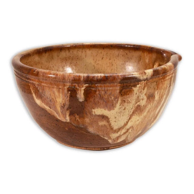 A modernist stoneware glazed ceramic bowl by Detroit artist John Glick of Plum Tree Pottery. Circa late 20th century....