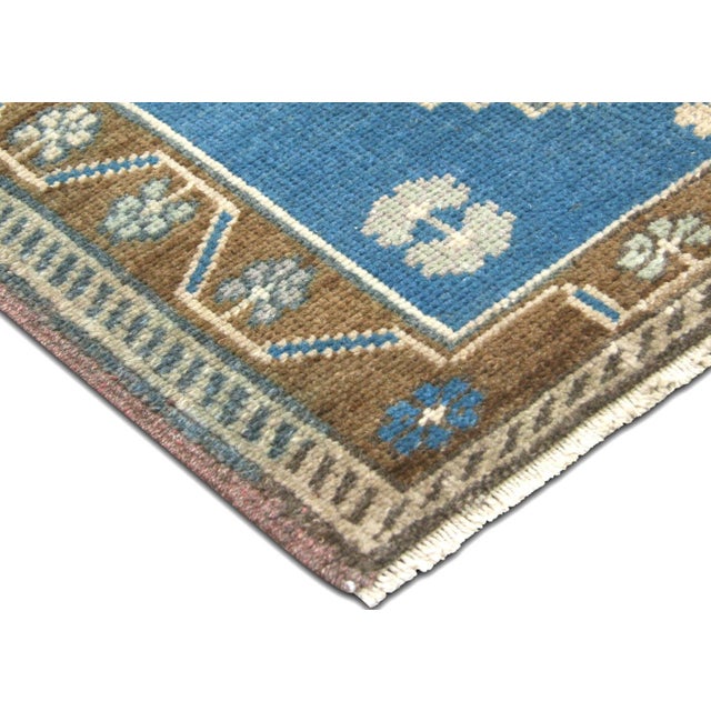 Hand-woven vintage Turkish Oushak yastik crafted with wool on wool in Western Turkey's storied weaving region. Measuring...