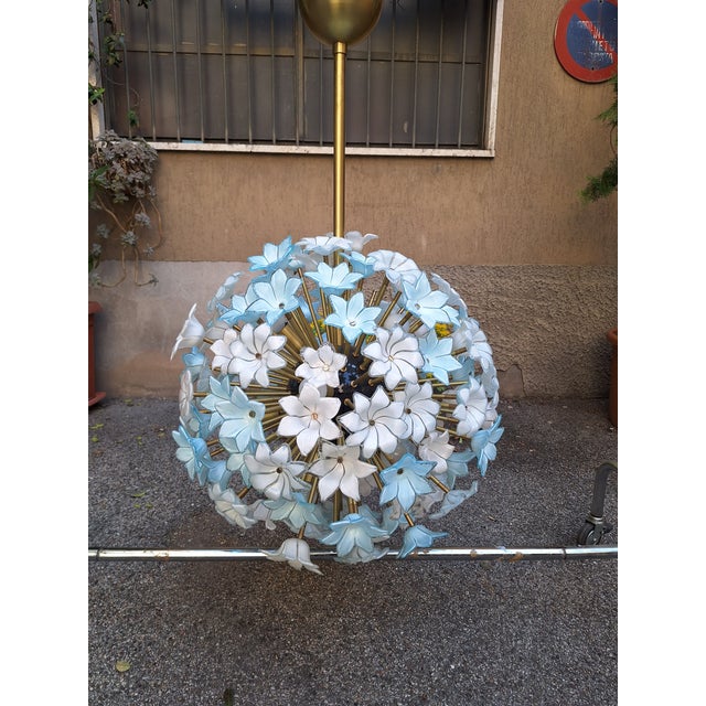 Large Brass Pendant Lamp with White and Blue Murano Glass Flowers, in Very Good conditions. Designed 1980 to 1989 I have...