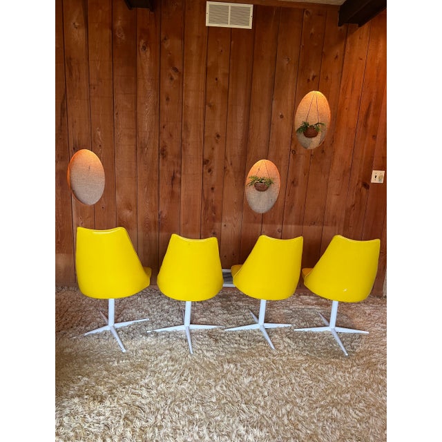 1970s Yellow Vinyl Dining Chairs Set of 4. From a 1972 home where everything is well maintained by the original owner.