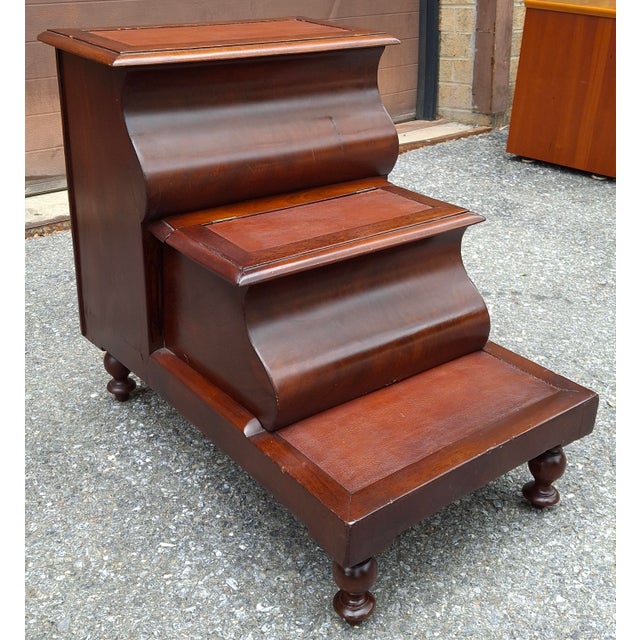 This is a 19th-century regency mahogany and Leather inset library or bed step commode with inset leather treads. These...