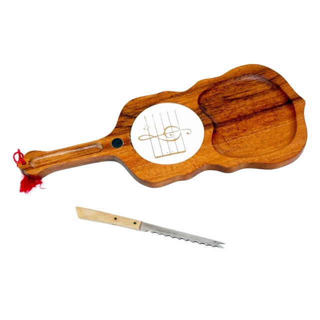 This whimsical mid-century modern cheese board brings a note of charm to your charcuterie game. Crafted in the shape of a...