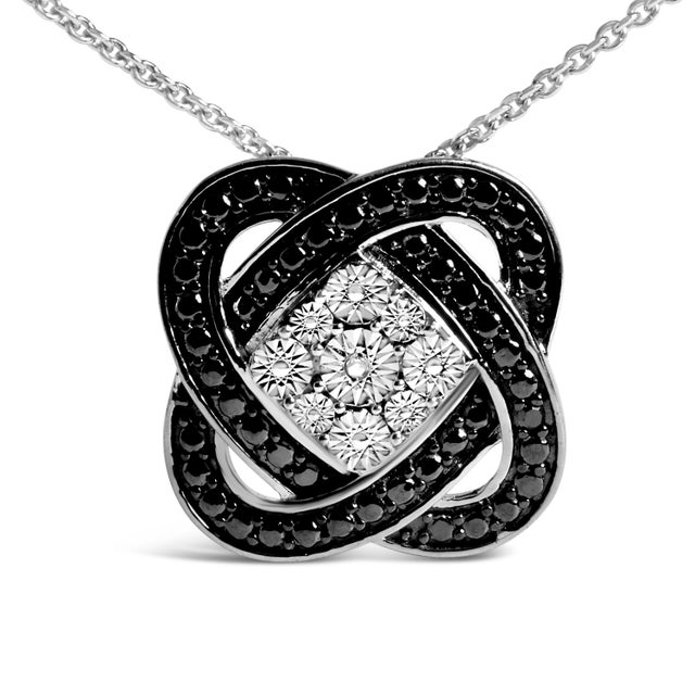 Embrace the elegance of the unexpected with this sterling silver necklace, adorned with a geometric knot pendant that...