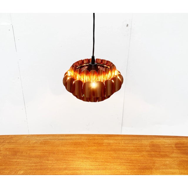 Imposing pendant lamp from Temde based on a design by Thorsten Orrling from the 60s. An elegant and timeless design with...
