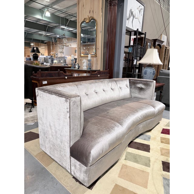 A beautifully sculpted vintage Dumont sofa by Mitchell Gold + Bob Williams, defined by its graceful curved silhouette and...