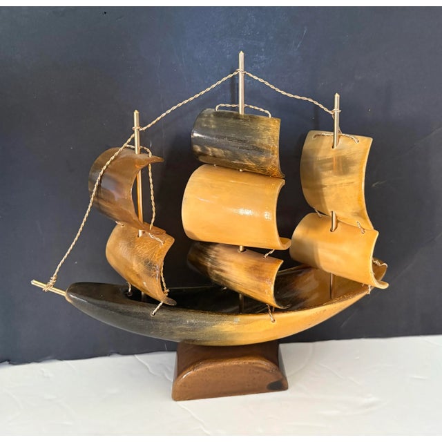 Beautiful vintage triple Matt schooner sailboat sculpture Made in the 70s of wood and horn shell, the sales are held...