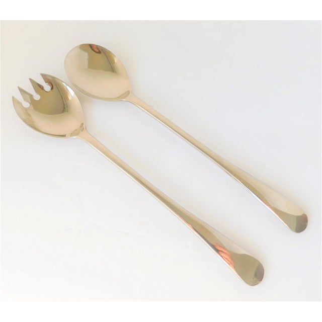 Pair of Raimond Silver Plate Italian Modern Serving Salad Spoon and Fork Set, Made in Italy. This sleek pair has so many...