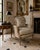 Elegant Wesley Hall armchair inspired by classic Louis XVI design, featuring a carved exposed wood frame with fluted legs,...