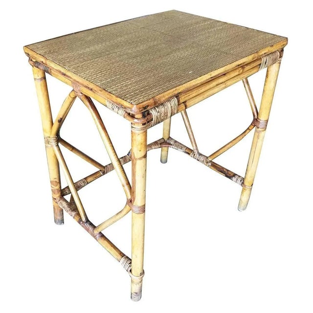 Simply yet elegant small rattan side table with steam-pressed diamond-shaped sides and rice mat top. The table features...