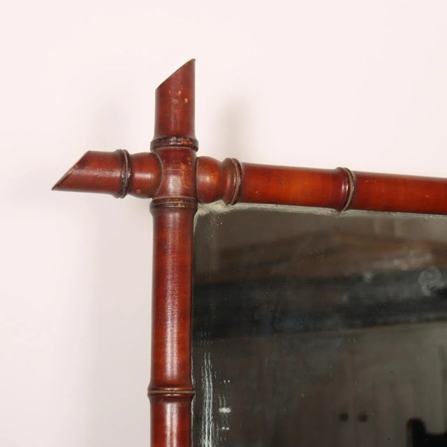 19th C French faux bamboo mirror with original mirror plate. 1890. This piece is designed in the style of the selected...