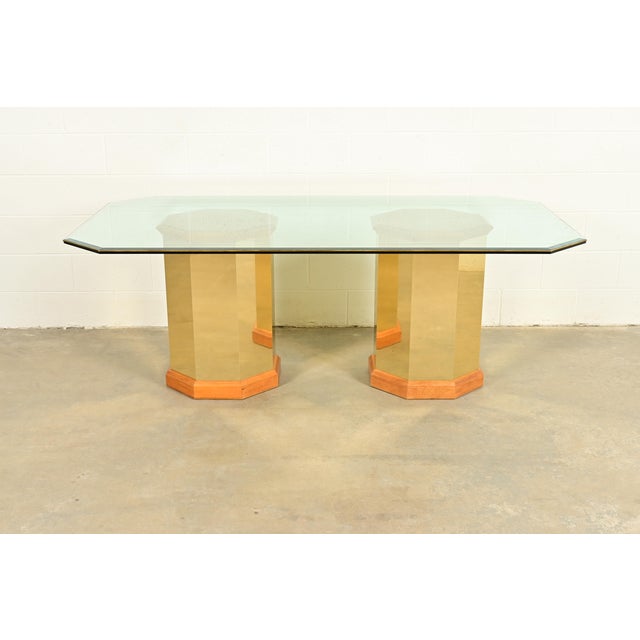 A gorgeous Modern Art Deco or Hollywood Regency double pedestal dining table By Thomasville USA, Circa 1980s Brass and oak...