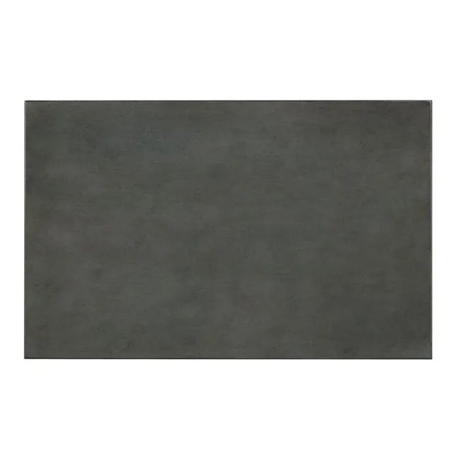 A rectangular chairside table with a tapering square column above a rectangular base. Care Instructions: Wipe with a soft...