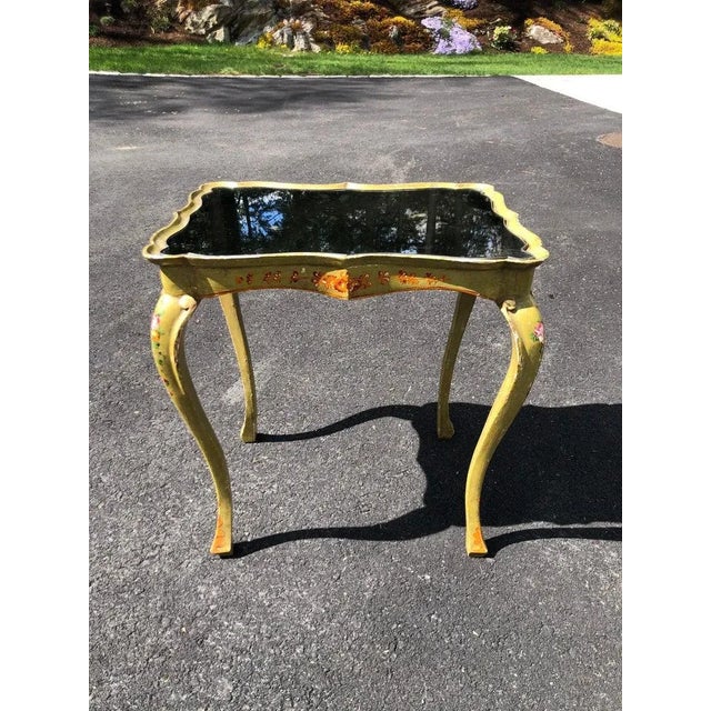 Italian hand painted mirror top side table. Scalloped edges and hand painted design make this table very special. Use in...