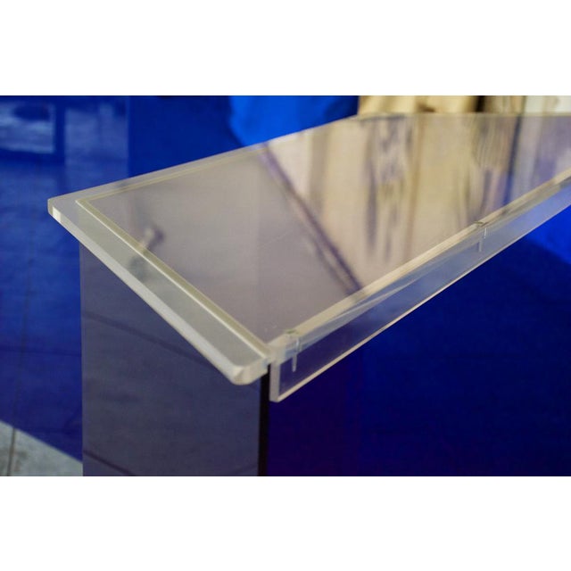 Set of two consoles in electric blue acrylic glass from the 80s, in very good condition, original patina.