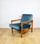 Wooden vintage armchair in brown and sea blue, designed by Z. Bączyk, made of light wood. A 1970s armchair designed by Z....
