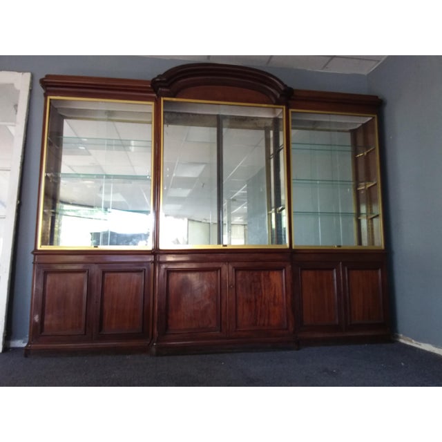 This is a three piece cabinet, the two end sections are 10” deep and 92” high and the center section is 14” deep and 98”...