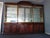 This is a three piece cabinet, the two end sections are 10” deep and 92” high and the center section is 14” deep and 98”...