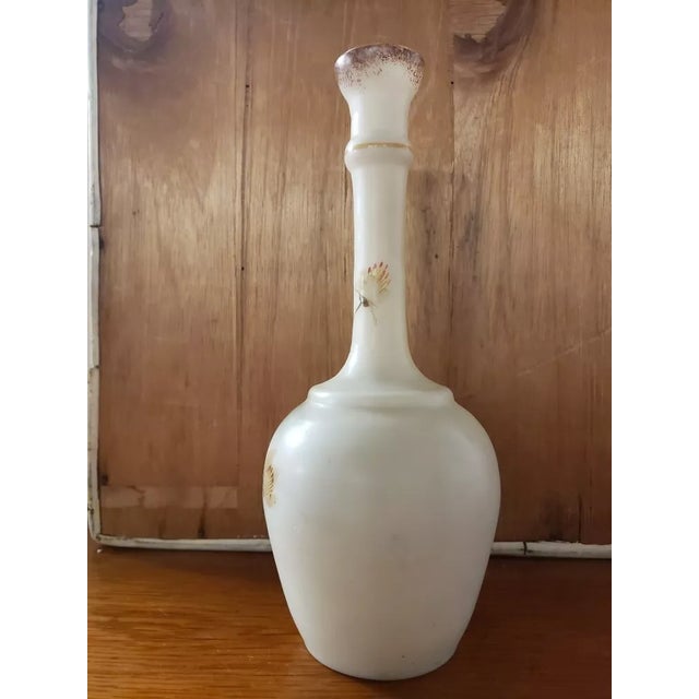 This is a Late 19th Century English Bristol Glass Hand Painted Bottle Vase. It measures 9 1/4" high and 3 3/4“ in...
