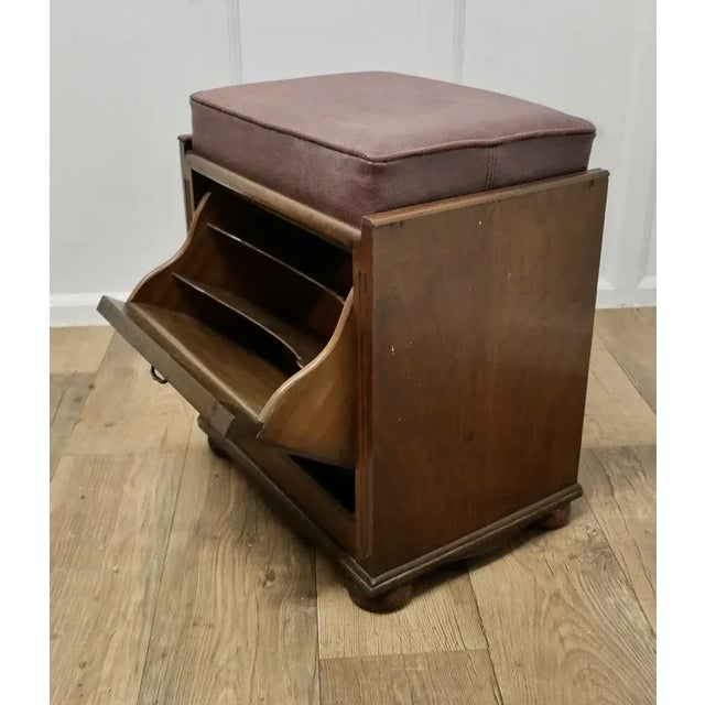 Victorian Walnut Upholstered Fall Front Piano Stool A lovely looking piece, the stool is a rectangular shape with a drop...