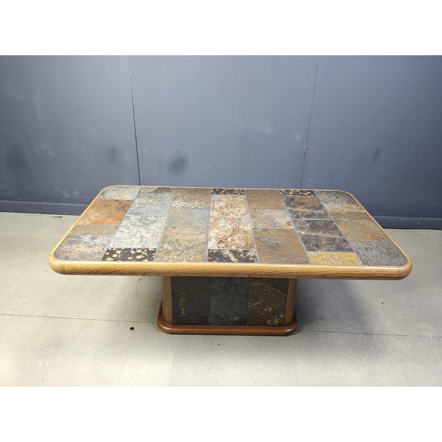 Brutalist Oak and Stone Coffee Table, 1970s, in Very Good conditions. Designed 1970 to 1979