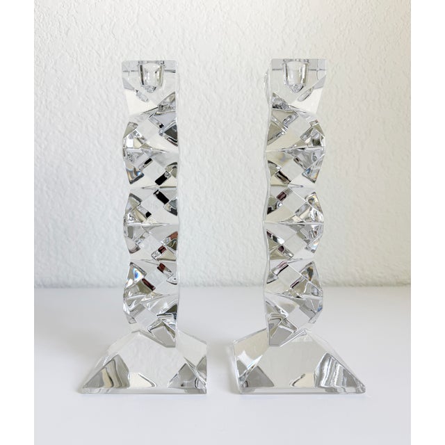 A sculptural pair of vintage Mikasa "Xenon" 9.5-inch crystal candlestick holders. Crafted from heavy lead crystal in...