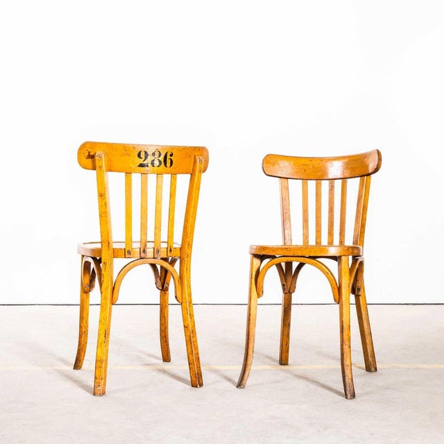 : 1950’s Baumann Blonde Oak Bentwood Dining Chair – Set Of Six. Made by the maker Baumann. Baumann is a slightly off the...