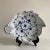 A classic, hand painted blue & white porcelain leaf shaped dish featuring a traditional floral pattern design by Royal...