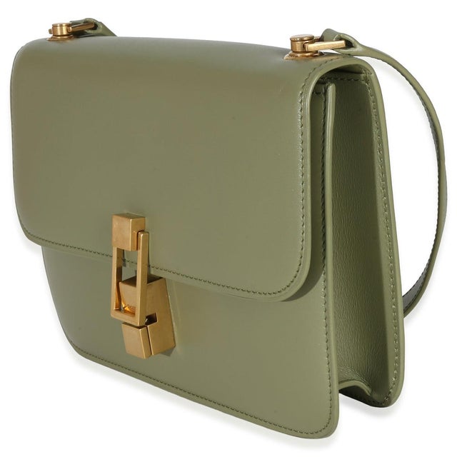 Item #: 153096 Interior Material: Leather MSRP: 2,900 Features Interior: Single zip and slot pocket Dimensions: 9 x 6 x...