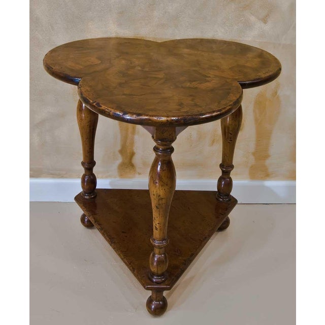 Hand crafted in Italy from solid walnut, this small end table features a distinctive clover leaf top finished in richly...