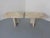 A pair of small, very heavy Italian tables made of solid travertine. Design from the 1970s.