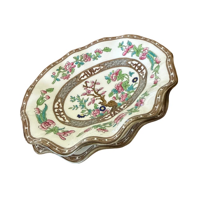 Bring a touch of timeless English elegance to your home with this beautiful pair of Coalport Indian Tree petite oval bone...