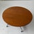c. 2018. Walnut top with aluminum group base.