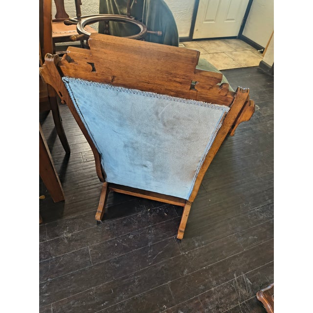 Eastlake Victorian oak platform rocker light blue in color works perfectly has some stains on the seat I haven't tried to...