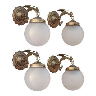 1950s Spanish Empire Cast Brass Dragon Sconces With Scavo Glass Globes - A Set of 4 For Sale