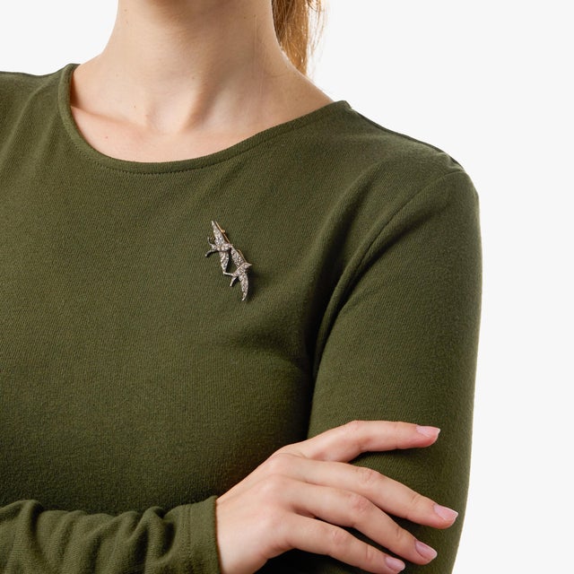 A charming antique double bird brooch that beautifully captures the romantic and nature-inspired design language of the...