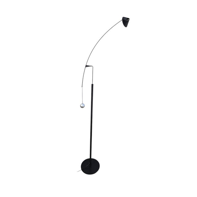 Nestore counterweight floor lamp by Artemide, designed by Carlo Forcolini, 1991. Shade with joints and 360° rotation with...