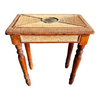 Vintage Rattan and Wood Side Table With Decorative Brass Medallion For Sale